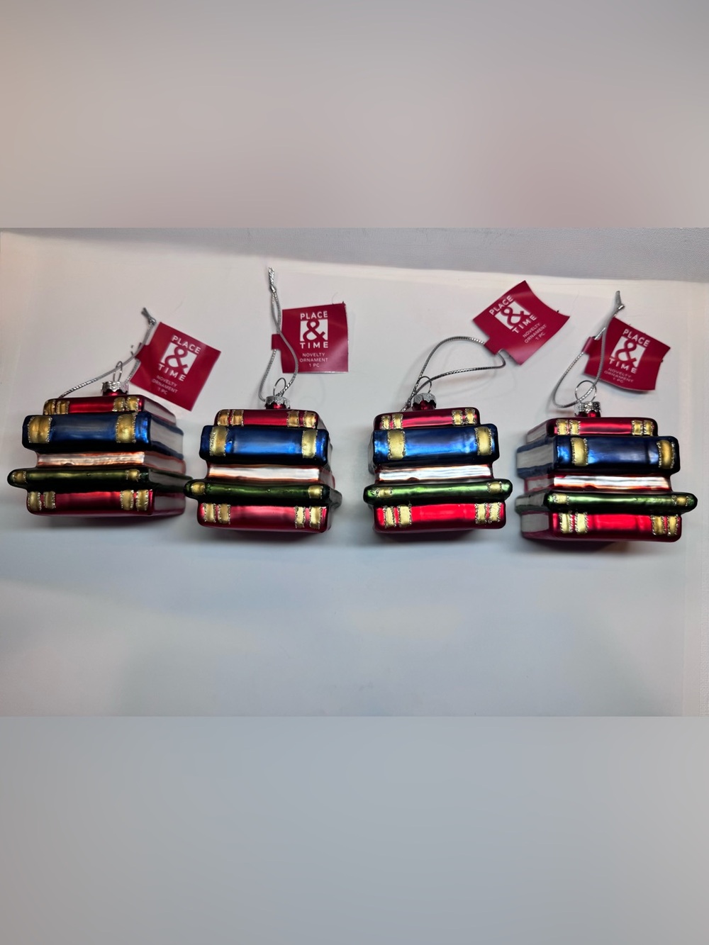 4 Pieces of Holiday Stacked Books Blown Glass Ornaments- Red, Blue, Green